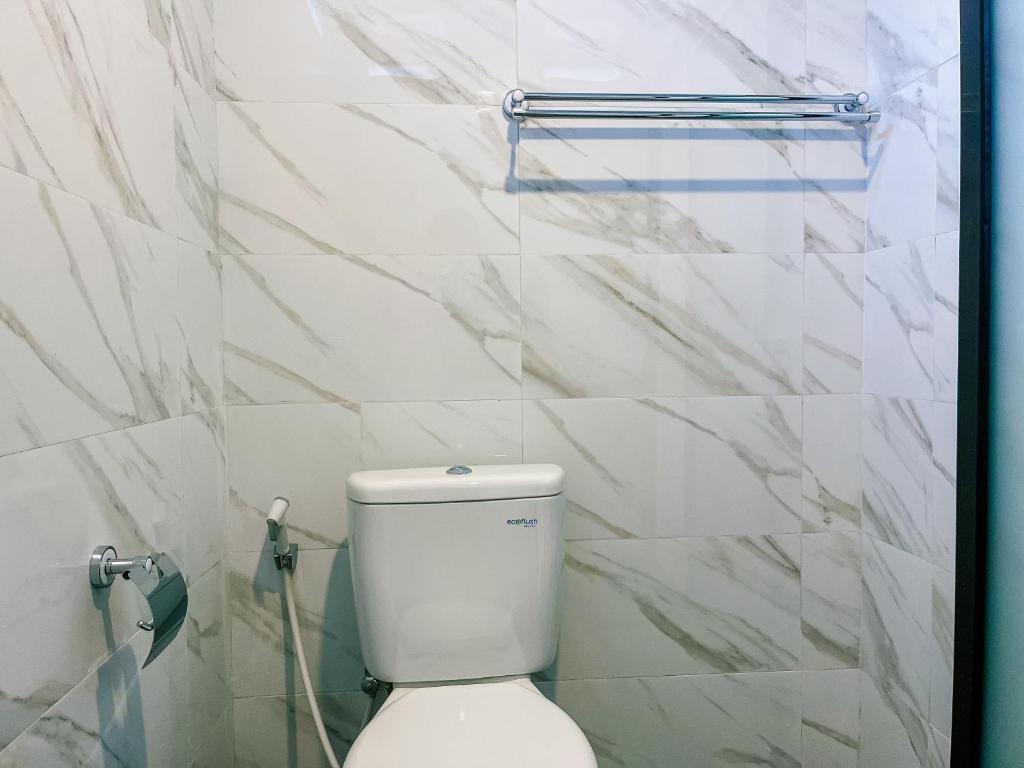 Koupelna v ubytování Sunarta House Homestay