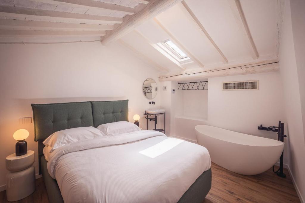 Postel nebo postele na pokoji v ubytování Suite Design & Spa