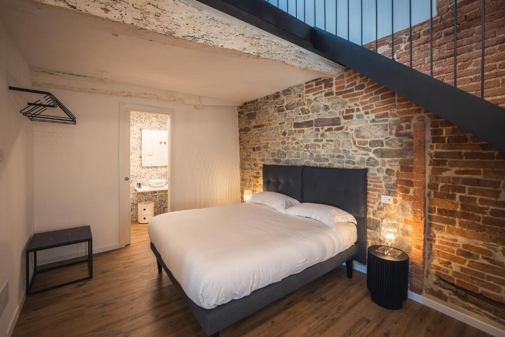 Postel nebo postele na pokoji v ubytování Suite Design & Spa