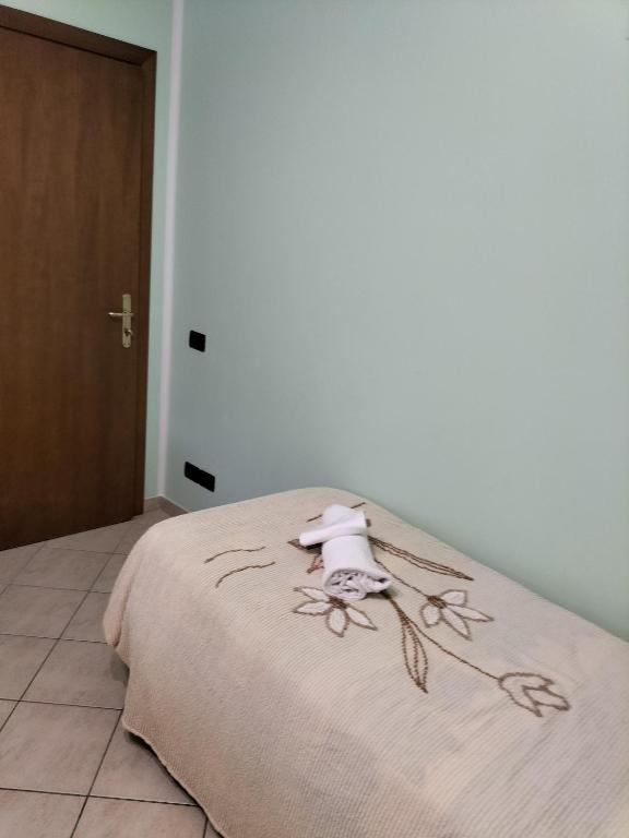 Łóżko lub łóżka w pokoju w obiekcie Hotel Grazia Ristorante