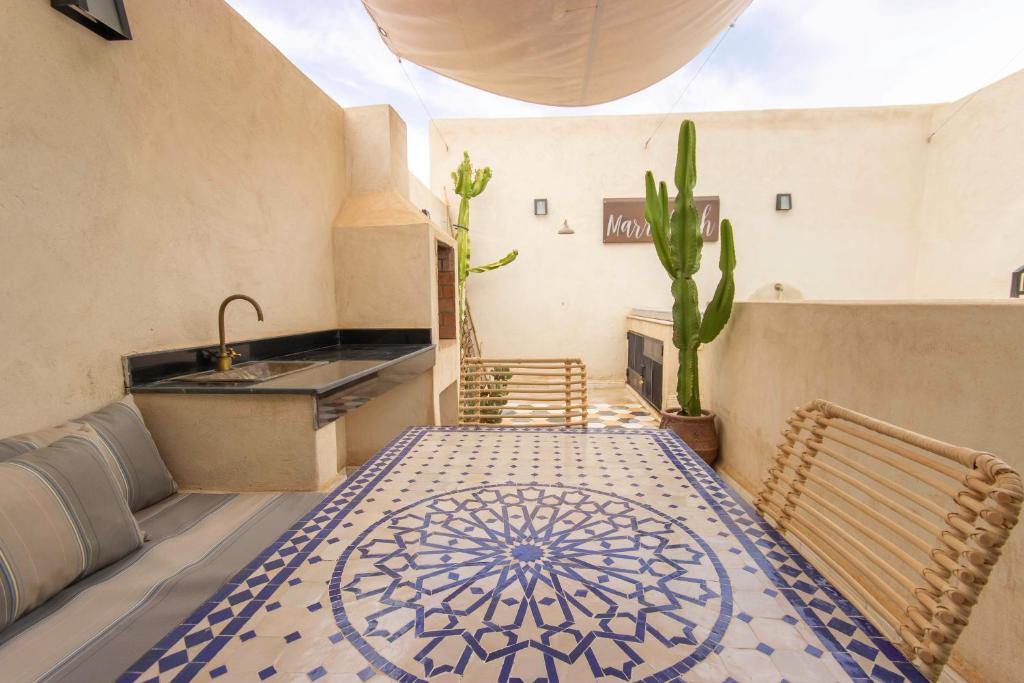 Postel nebo postele na pokoji v ubytování Riad Les Suites Marrakech