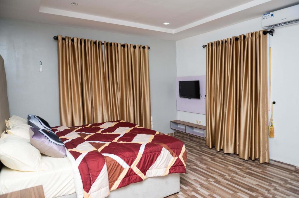 Postel nebo postele na pokoji v ubytování Goodis Apartments Ajah