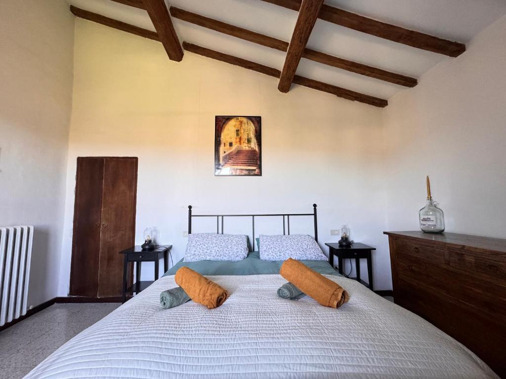 Postel nebo postele na pokoji v ubytování Casa Montecastelli Sopra/Terra