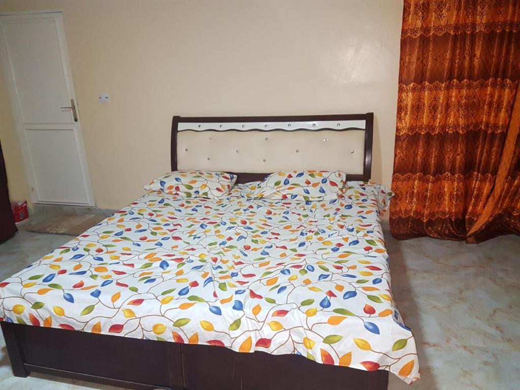 Giường trong phòng chung tại NABIEU Immobile