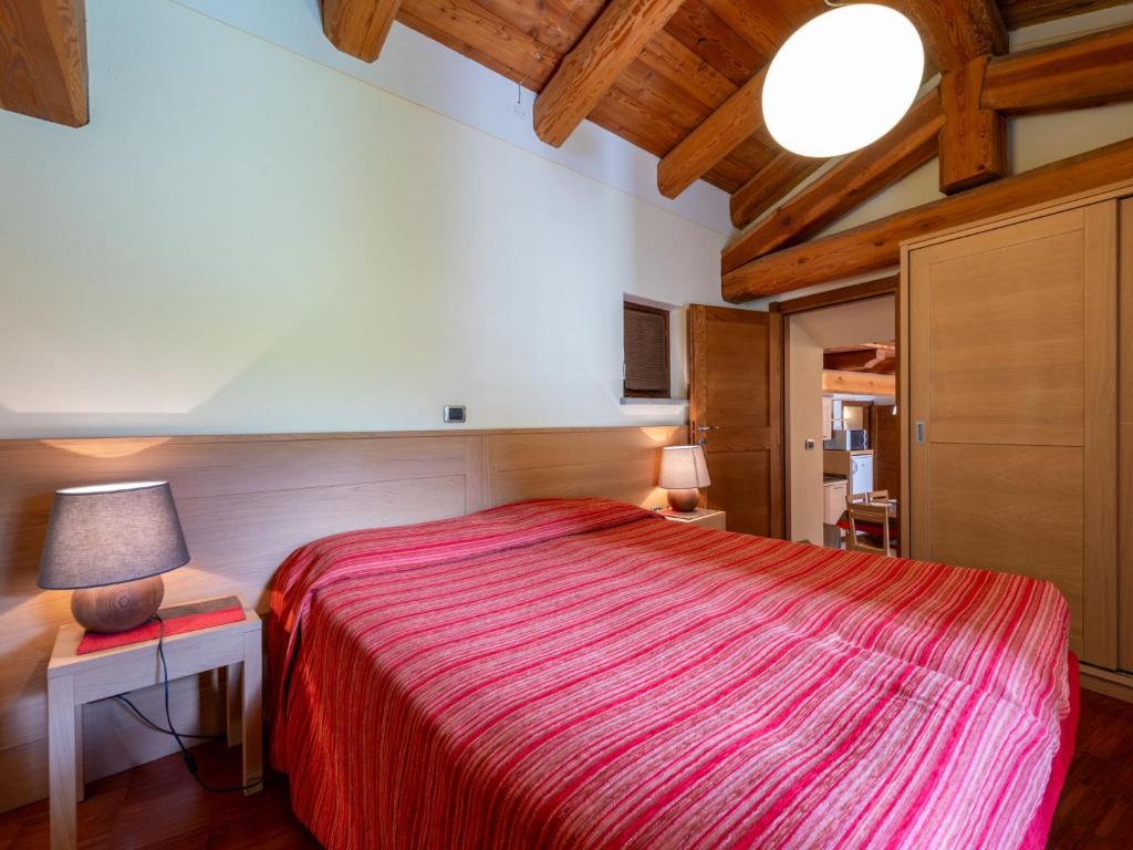 Posteľ alebo postele v izbe v ubytovaní Apartment La Borgata by Interhome