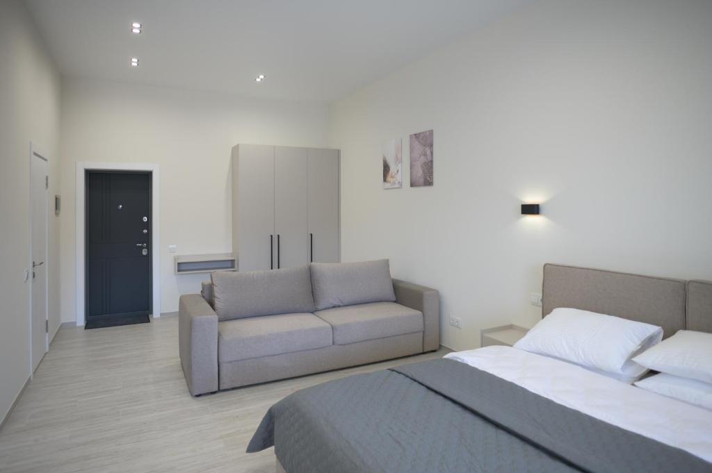 Postel nebo postele na pokoji v ubytování REST INN apart hotel