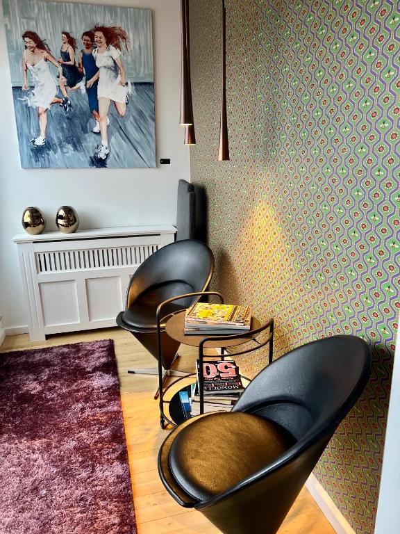 Posezení v ubytování Mortens Kro Boutique Hotel