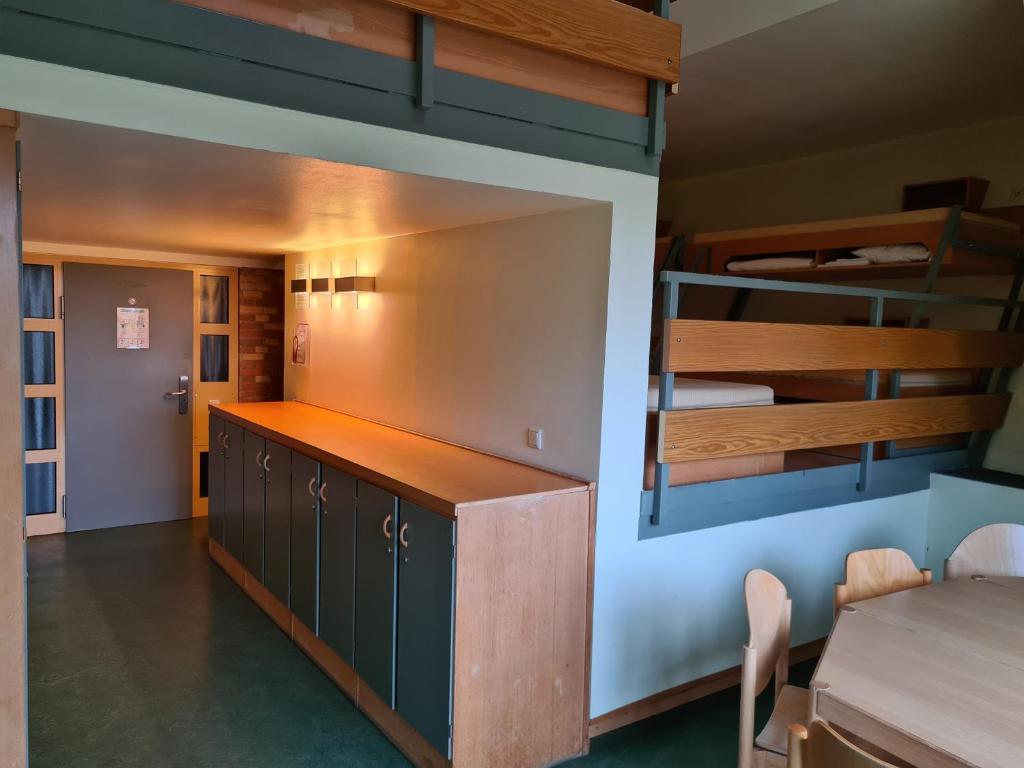 Postel nebo postele na pokoji v ubytování Jugendgästehaus St.-Michaels-Heim
