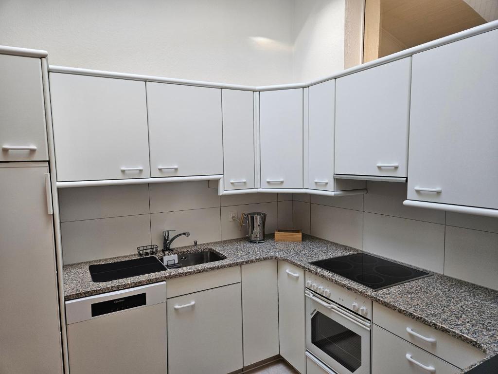 Kuchyň nebo kuchyňský kout v ubytování Apartment Sweet Home Sion