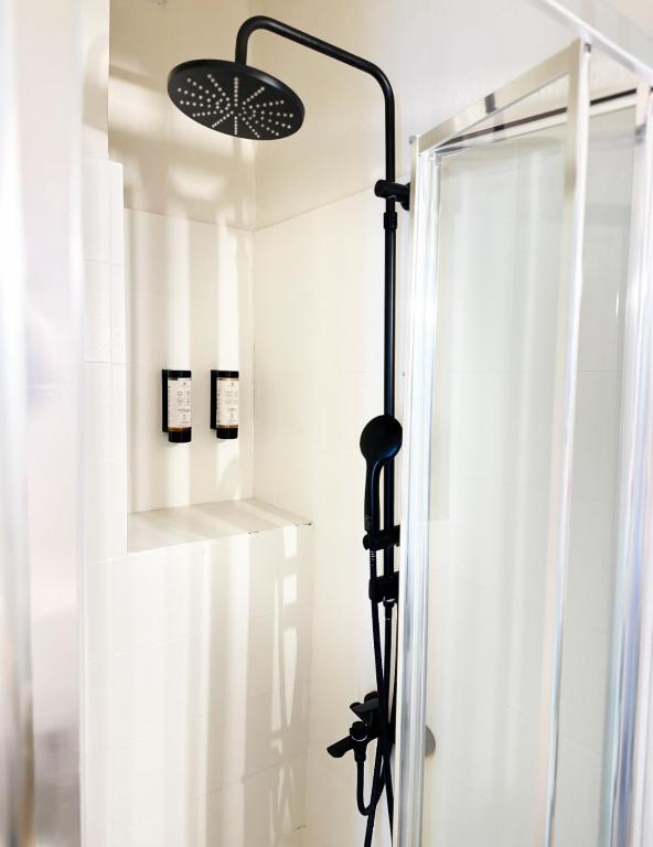 Koupelna v ubytování OIKO MINI SUITES