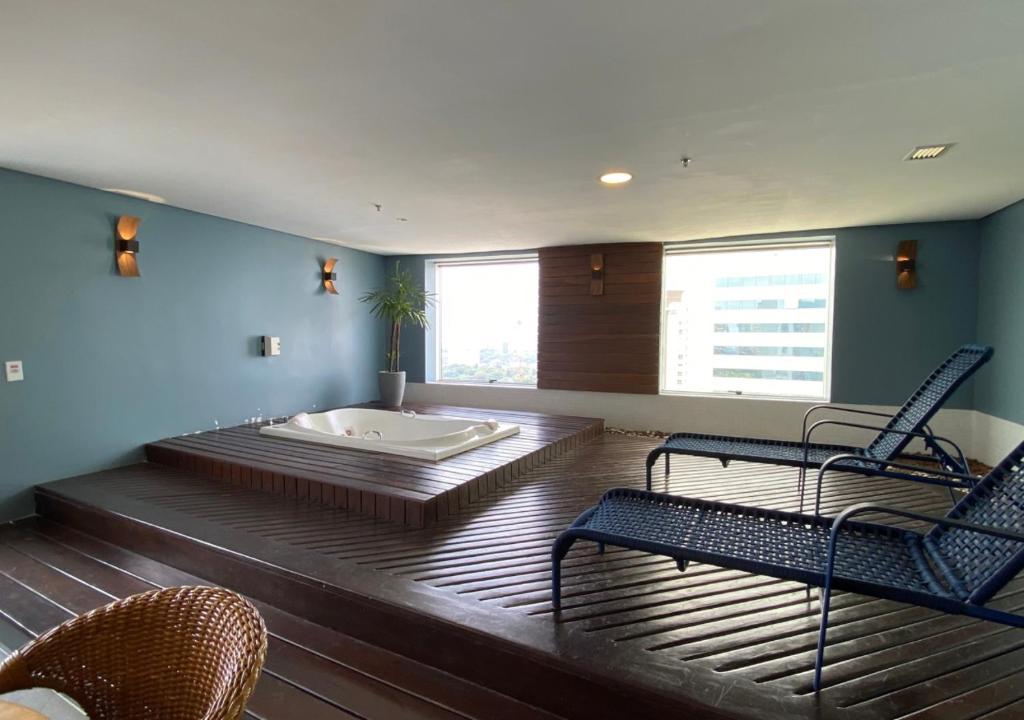 Postel nebo postele na pokoji v ubytování uma joia no Hotel Mercure Manaus