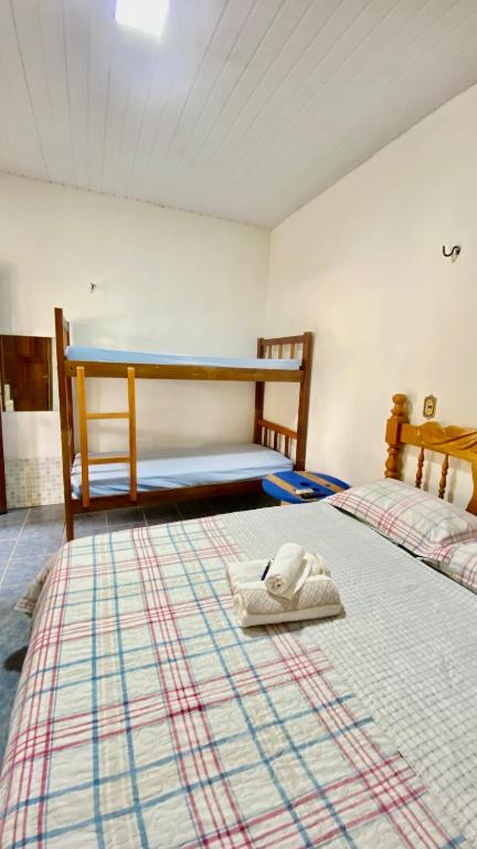 Postel nebo postele na pokoji v ubytování POUSADA FLORA