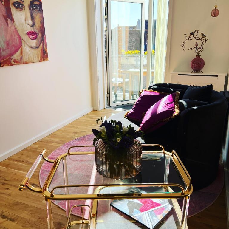 Posezení v ubytování Mortens Kro Boutique Hotel