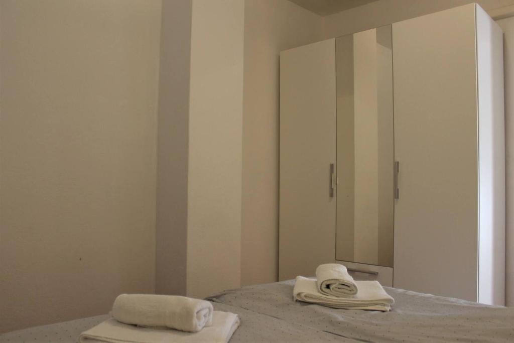 Postel nebo postele na pokoji v ubytování Apartments Zeljko B