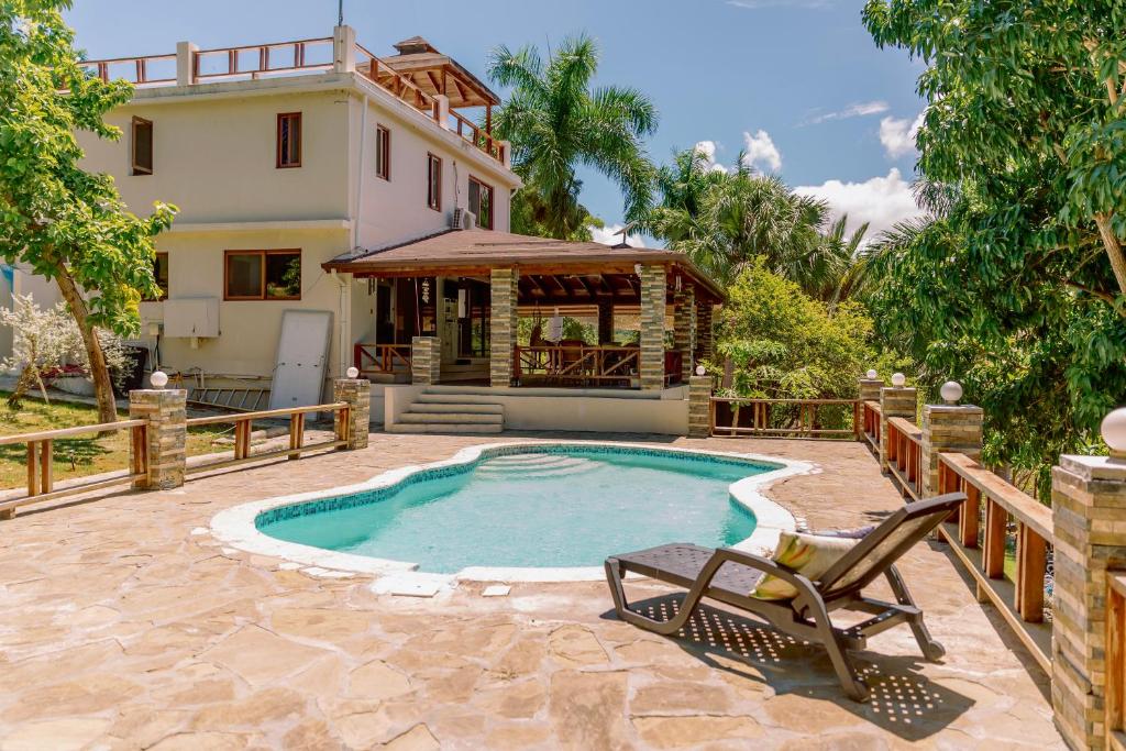 Bazén v ubytování Exclusive Mountain Villa with Ocean View near Puerto Plata nebo v jeho okolí