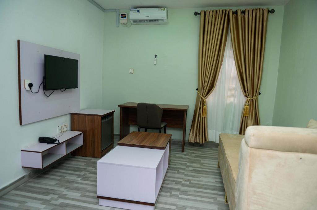 TV a/nebo společenská místnost v ubytování Goodis Apartments Ajah