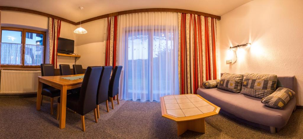 Posezení v ubytování Pension Schweizerhof