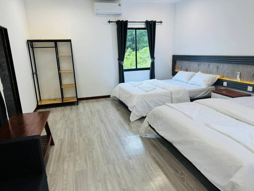 Postel nebo postele na pokoji v ubytování Real Hostel