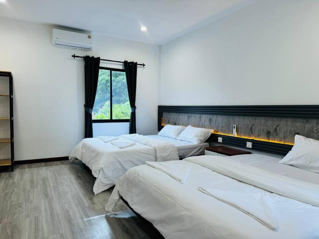 Postel nebo postele na pokoji v ubytování Real Hostel