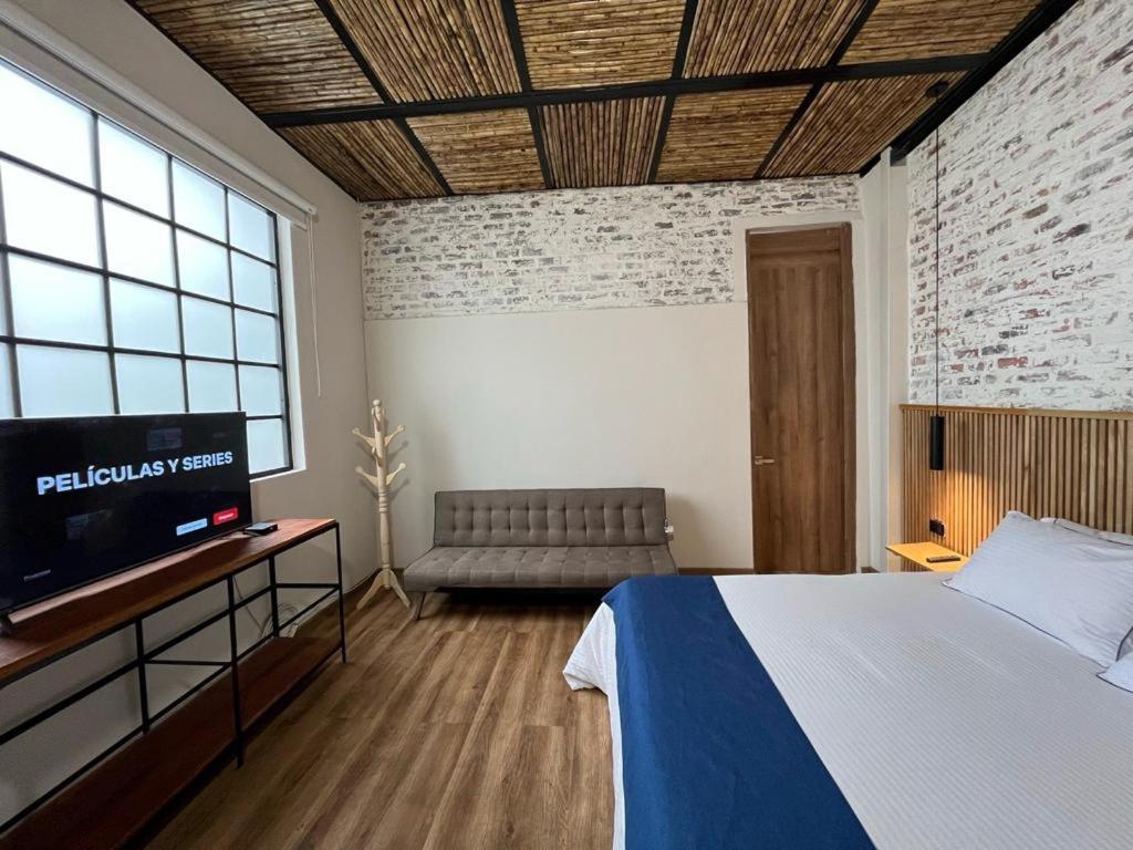 Postel nebo postele na pokoji v ubytování Casa 121, calle 121 no 7-18