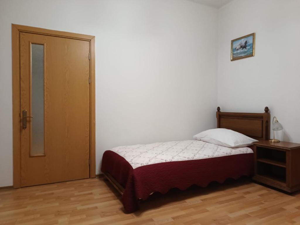 Postel nebo postele na pokoji v ubytování Вілла Токай