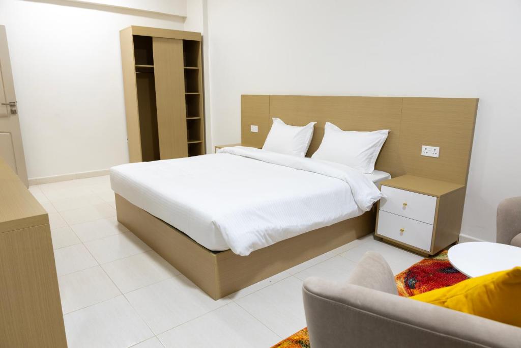 Postel nebo postele na pokoji v ubytování Riviera suites , hotel apartement