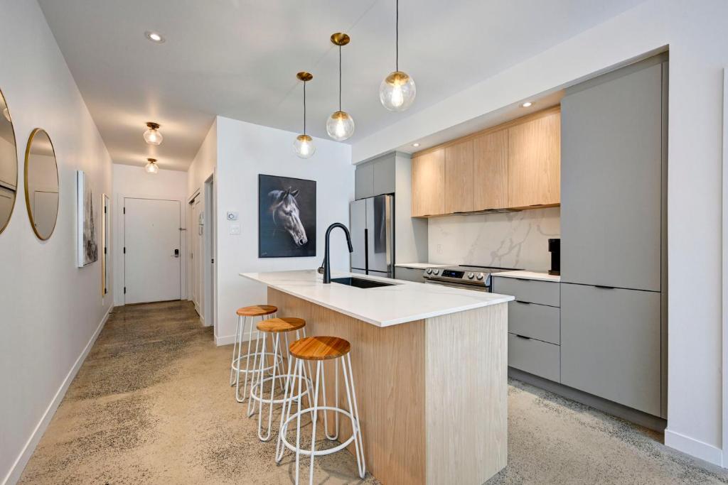 Η κουζίνα ή μικρή κουζίνα στο Condo Hotel 202