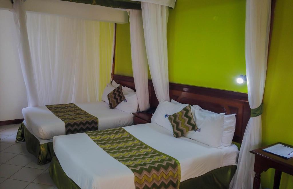 Cama o camas de una habitación en 67 Airport Hotel Nairobi