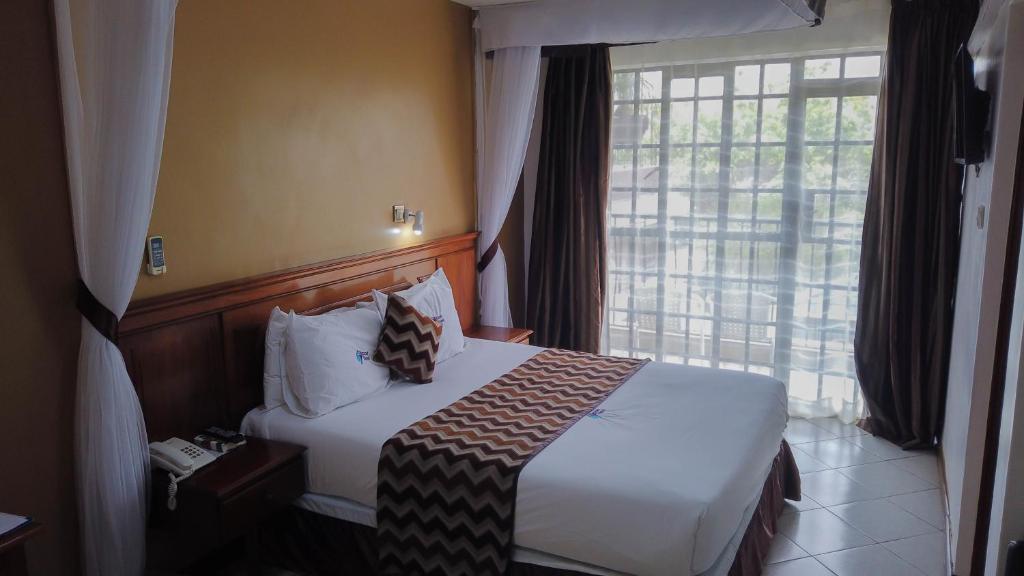 Cama o camas de una habitación en 67 Airport Hotel Nairobi