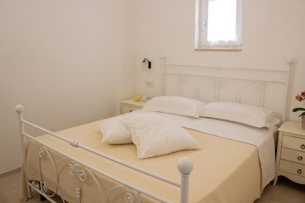 Postel nebo postele na pokoji v ubytování HOSTuni