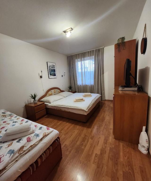 Posteľ alebo postele v izbe v ubytovaní Apartment Olivia