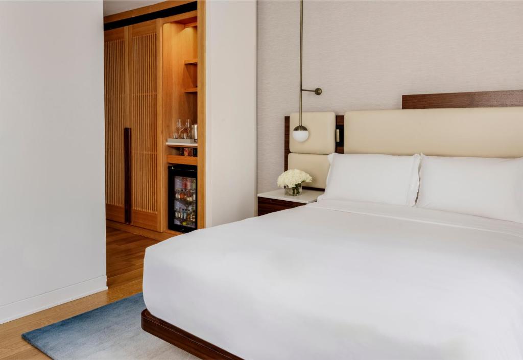 Voodi või voodid majutusasutuse Bryant Park Hotel toas