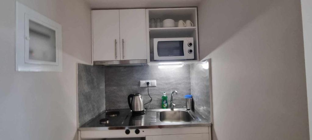 Kuchyň nebo kuchyňský kout v ubytování Casa Tua