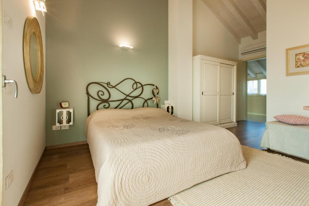 Posteľ alebo postele v izbe v ubytovaní B&B Cà Dea Calle