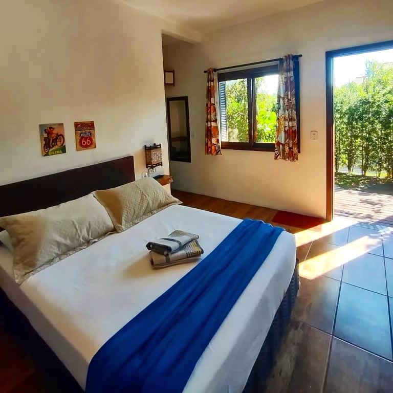 Cama ou camas em um quarto em Santa Monica Hospedaria