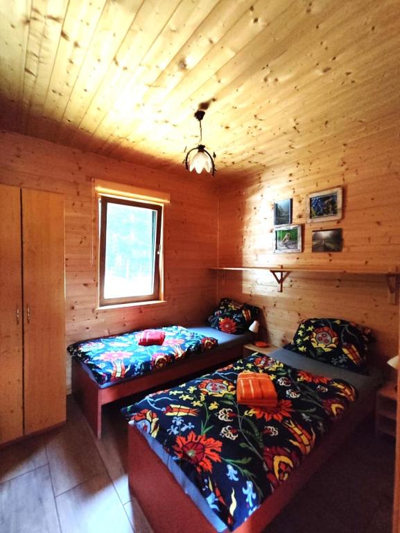 Postel nebo postele na pokoji v ubytování Agroturystyka Polana Harmonii