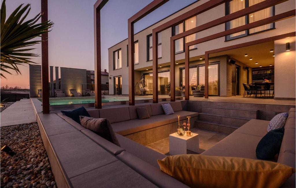 a living room of a house with a couch at Villa Carlotta in Vižinada