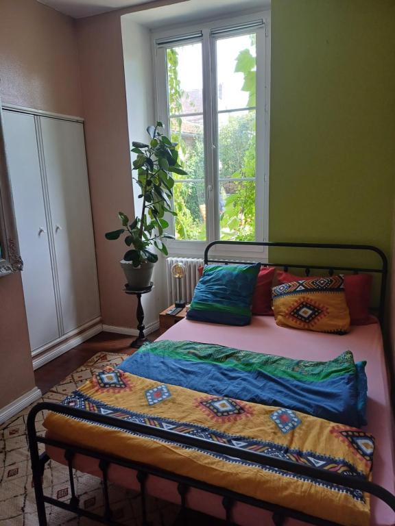 Postel nebo postele na pokoji v ubytování Gite Frederic