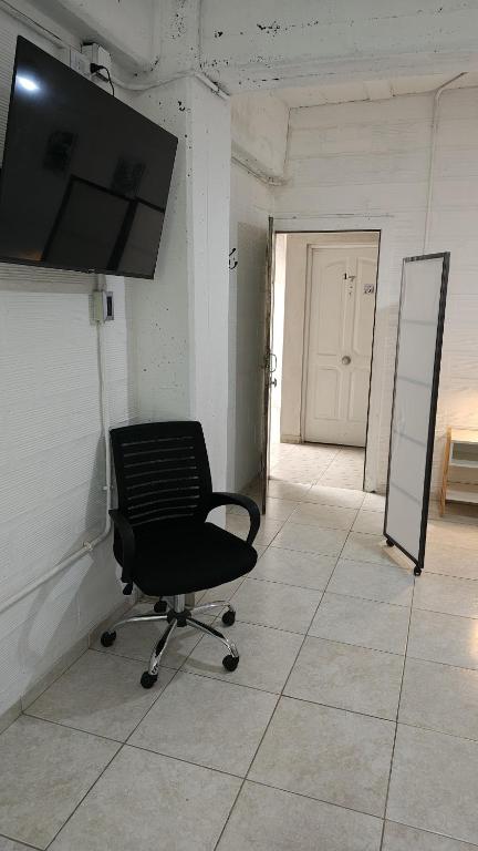 TV a/nebo společenská místnost v ubytování Departamento equipado, centrico, cochera cubierta Sarmiento265apart D18