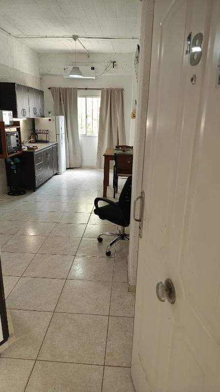 Kuchyň nebo kuchyňský kout v ubytování Departamento equipado, centrico, cochera cubierta Sarmiento265apart D18