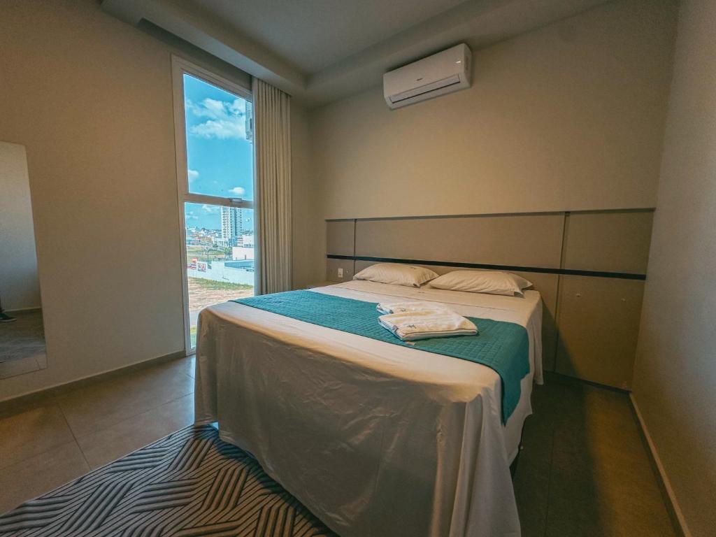 Postel nebo postele na pokoji v ubytování Raf Hotel