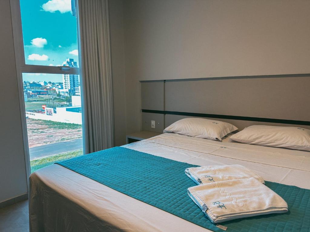 Postel nebo postele na pokoji v ubytování Raf Hotel