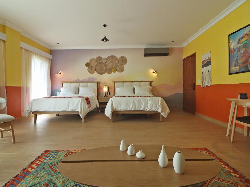 Postel nebo postele na pokoji v ubytování Hotel Boutique Típico