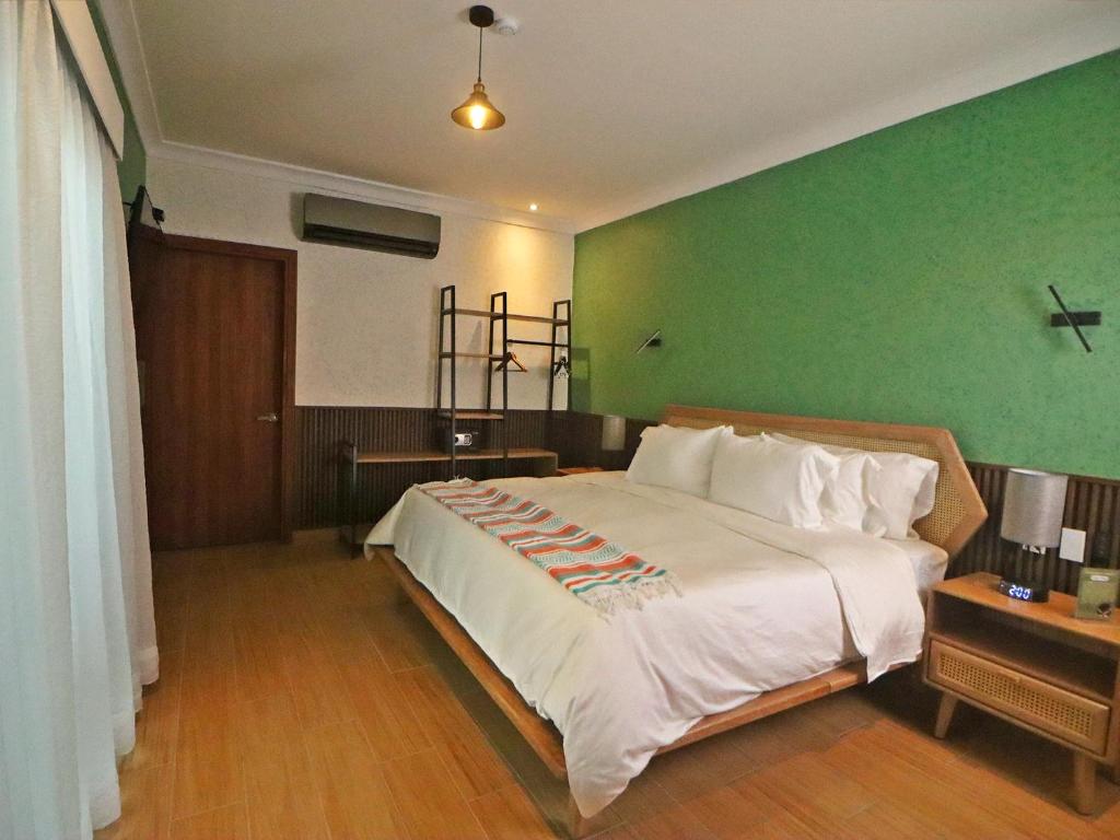 Postel nebo postele na pokoji v ubytování Hotel Boutique Típico