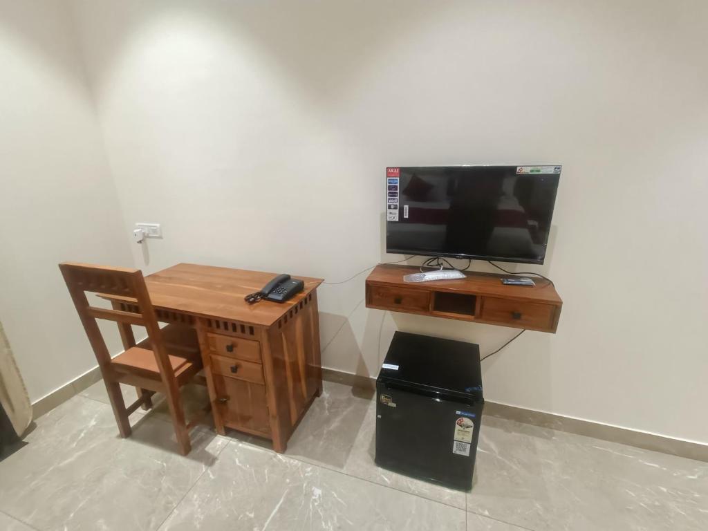 TV a/nebo společenská místnost v ubytování Shantadurga Beachside Homestay