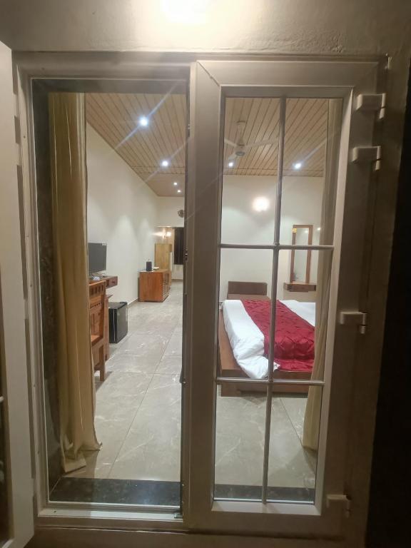 Postel nebo postele na pokoji v ubytování Shantadurga Beachside Homestay