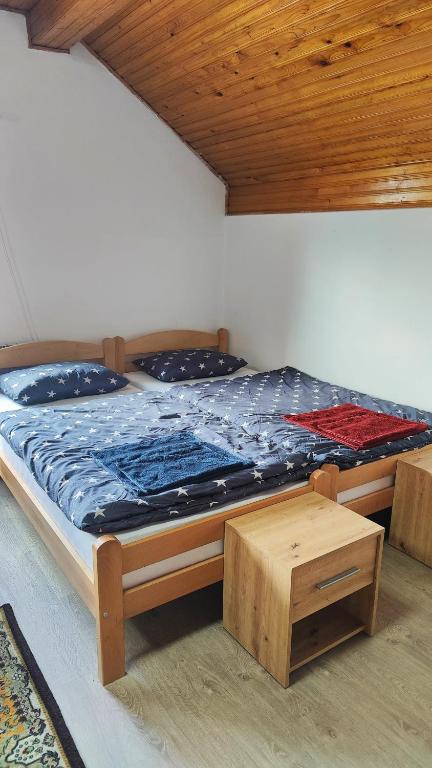 Postel nebo postele na pokoji v ubytování Prenoćište 3 sobe