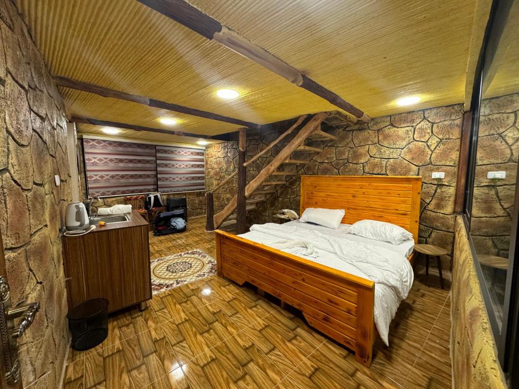 Postel nebo postele na pokoji v ubytování Dana Gate Lodge