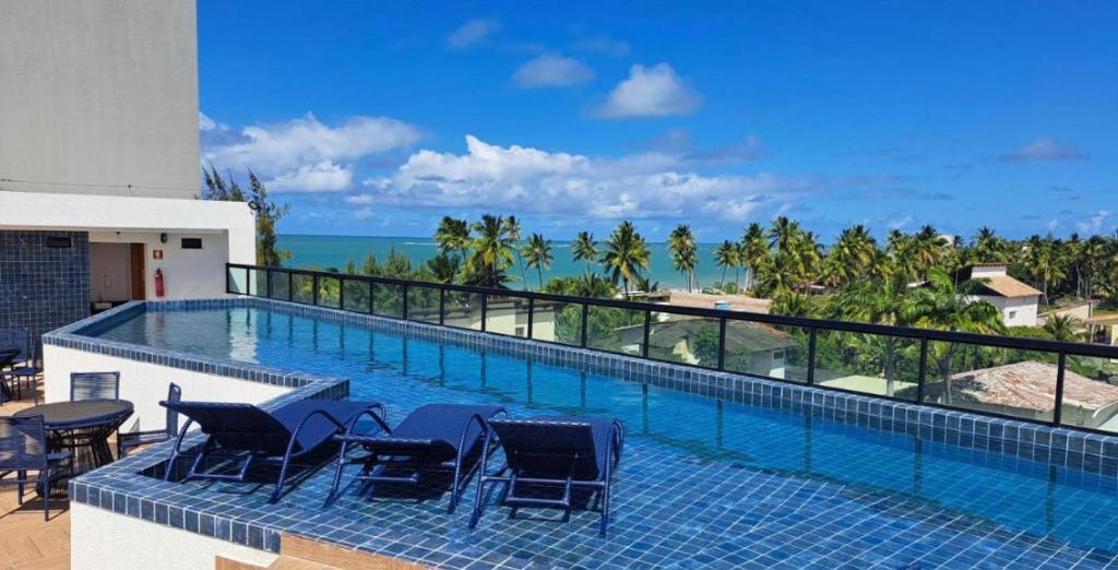 Πισίνα στο ή κοντά στο Flat Beira Mar Maracaípe- Porto de Galinhas