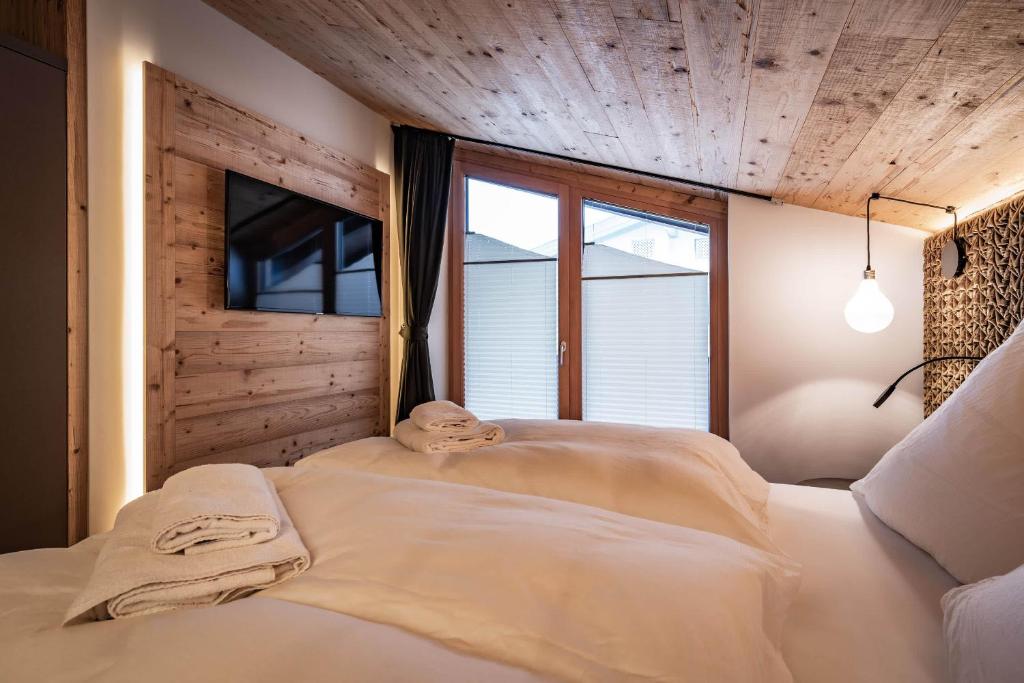 Posteľ alebo postele v izbe v ubytovaní Loft in the Alps Penthouse